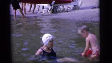 Camden New Jersey (1964): Boy Playing In The Shallow Water At The Beach With An