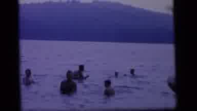 Camden New Jersey (1964): Man In Lake Tossing Child Into Water Among Group Of