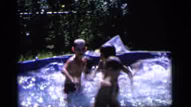Camden New Jersey (1964): 4 Kids Playing In Inflatable Swimming Pool In Backyard
