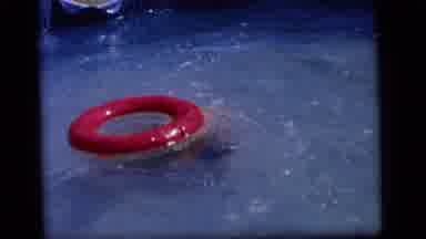 Camden New Jersey (1964): Boy Swimming In An Above-Ground Pool And Playing With A