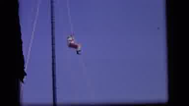 Camden New Jersey US (1964): Man Climbs Down Rope
