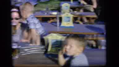 Camden New Jersey US (1964): Peoples And Childrens Are Sitting In The Tables Front