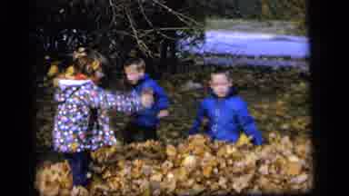 Camden New Jersey US (1964): Two Boys And A Girl Playing And Jumping Into A Big