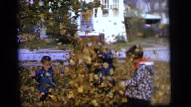 Camden New Jersey US (1964): The Kids Are Enjoying The Fall Season Playing With