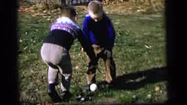 Camden New Jersey US (1964): The Boys Are Playing With The Ball And The Girl Was