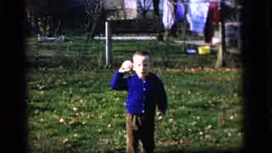 Camden New Jersey US (1964): Kid Throwing Baseball In The Backyard