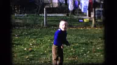 Camden New Jersey US (1964): Kids Playing With A Ball And Running In The Backyard