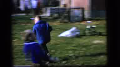 Camden New Jersey US (1964): Children Playing Football Outside