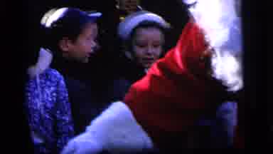 Camden New Jersey US (1964): Santa And Mrs Claus Handing Out Candy To A Crowd Of