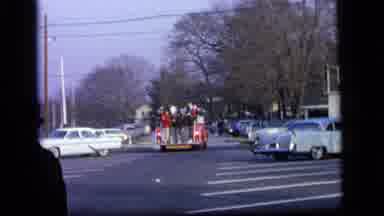 Camden New Jersey US (1964): Children Ride On The Small Fire Truck And Wave As It