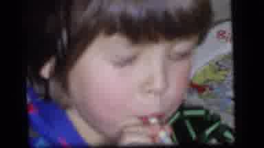 Camden New Jersey US (1964): The Little Person Doing Something To Put In The Mouth