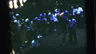 Camden New Jersey USA (1964): Lots Of People Gathered In The Forest While A Man