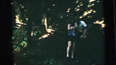 Camden New Jersey USA (1964): Young Couple Hug Then Walk Down A Hill Towards The
