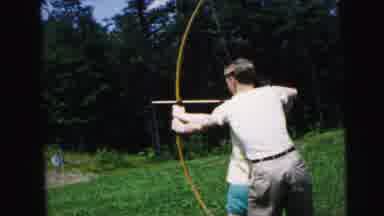 Camden New Jersey USA (1964): A Man Giving The Arrow Practice To The Woman