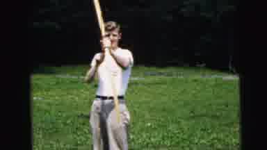 Camden New Jersey USA (1964): Young Man Shoots An Arrow With A Bow In Large Open