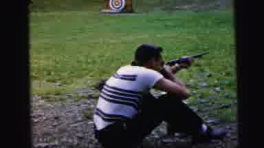 Camden New Jersey USA (1964): Man Shooting A Target In A Field