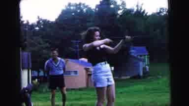 Camden New Jersey USA (1964): The Boy And Girl Are Playing Something In The Ground