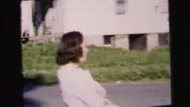 Camden New Jersey USA (1964): Two Women Chat To Each Other While Watching A Man