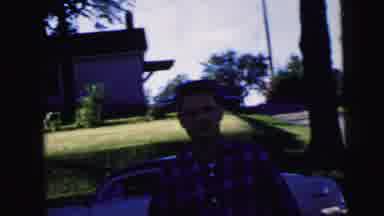 Camden New Jersey USA (1964): Man Wearing Red Plaid Shirt Walks Away From White