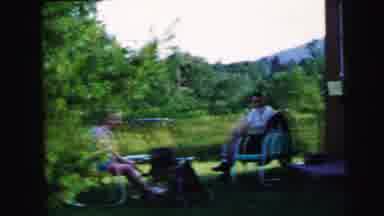 Camden New Jersey USA (1964): Family Sitting Outside On Pretty Day Toddler Walks