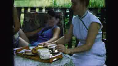 Camden New Jersey USA (1964): People Are In The Garden Doing Something In The