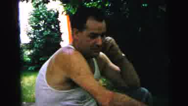 Camden New Jersey USA (1964): Man Sitting In Steps Relaxing And Dog Misses Man