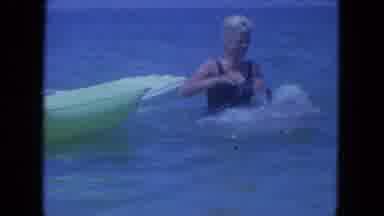 Clearwater Florida (1964): Three Women Laying On Pool Floaters And One Falls In