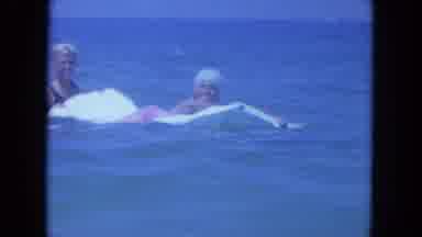 Clearwater Florida (1964): Three People In The Ocean Playing One Is Lying On A