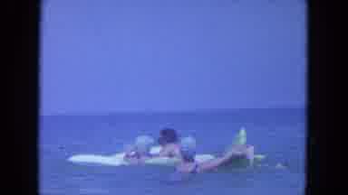 Clearwater Florida (1964): People Swim In The Water Together With Floats And The
