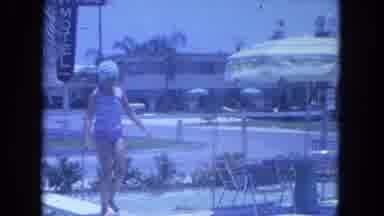 Clearwater Florida (1964): A Girl In A Swimsuit And Cap Jumps Off A Diving Board