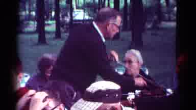 Cleveland Ohio (1964): A Family With Younger And Older People Picnic Outside On A