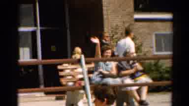 Cleveland Ohio (1964): Old Couple Sitting On Bench Wife Waves