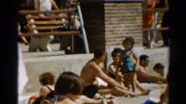 Cleveland Ohio (1964): Girl Wearing Green Swimwear Talks To Man Wearing Black