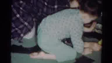 Cleveland Ohio (1964): Boy Playing With Toy Train On Floor