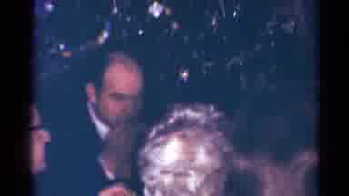 Cleveland Ohio (1964): A Family Having A Christmas Dinner In Front Of A Christmas