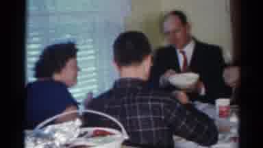 Cleveland Ohio (1964): Adults Sitting At A Table Serving And Eating Food