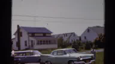 Elkhart Illinois USA (1964): Lady In An A-Line Dress Holding Hands With A Little