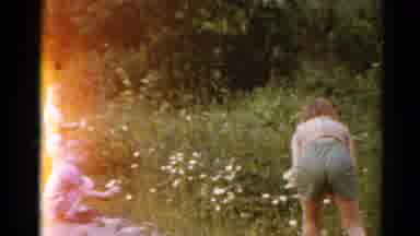 Elkhart Illinois USA (1964): The Small Boys And The Lady Is Collecting The Flowers