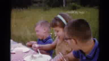 Elkhart Illinois USA (1964): The Childrens Are Eating Food On The Park They Are