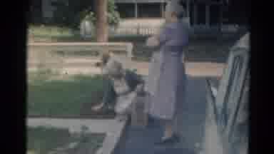 Elkhart Illinois USA (1964): Vintage Film Shows A Woman Gardening And Another