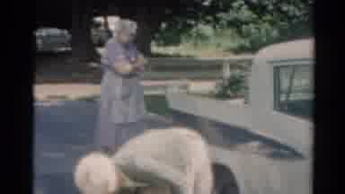 Elkhart Illinois USA (1964): The Woman Walks Near The Car In The House