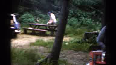 Elkhart Illinois USA (1964): People Get Things From The Car As Others Set The