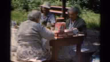 Elkhart Illinois USA (1964): 3 People Having Lunch At A Picnic Table