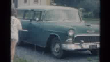 Elkhart Illinois USA (1964): Female Taking A Picture With Her Car