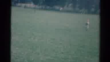 Elkhart Illinois USA (1964): Kids Playing Catch With Their Father In The Summer