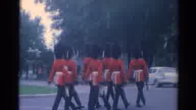 Elkhart Illinois USA (1964): Changing Of The Guard Soldiers March Down The Street