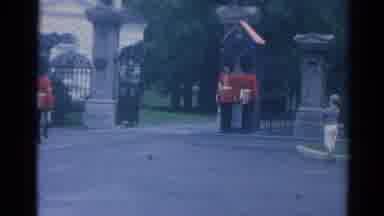 Elkhart Illinois USA (1964): Queen's Guard Securing Post As Nearby Tourists Watch