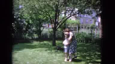 Evanston Illinois (1964): Family Playing In Garden With Their Dog