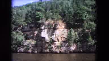Evanston Illinois (1964): Sailing Along A River With Natural Rock Formations
