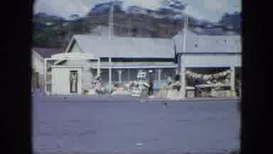 Grenada (1964): Presentation Of A Strange Little Village With Strange Stalls And A